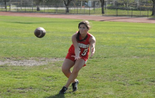 Varsity Flag Football Captain Michelle Goldman catching a pass. Photo Credit:JP PORTRAITS