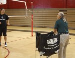 Math teacher Warren Denise coaching the varsity boys volleyball team. Denise is one of a number of teachers who dedicate their time after school to coaching a sport. Photo Credit: KAYLA LOKEINSKY